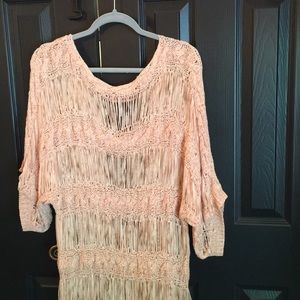 Loosely knit peach dress